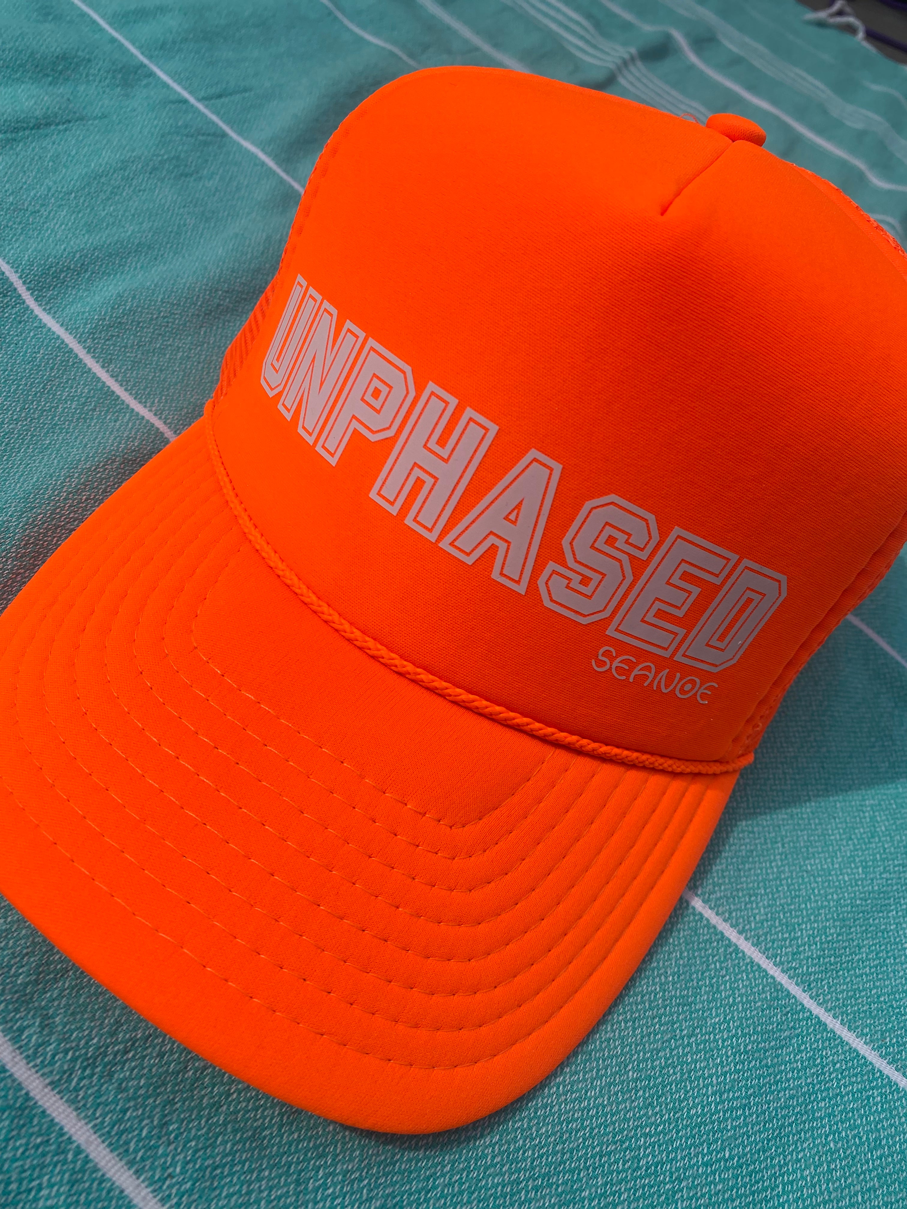 NEON ORANGE SEANOE TRUCKER HAT